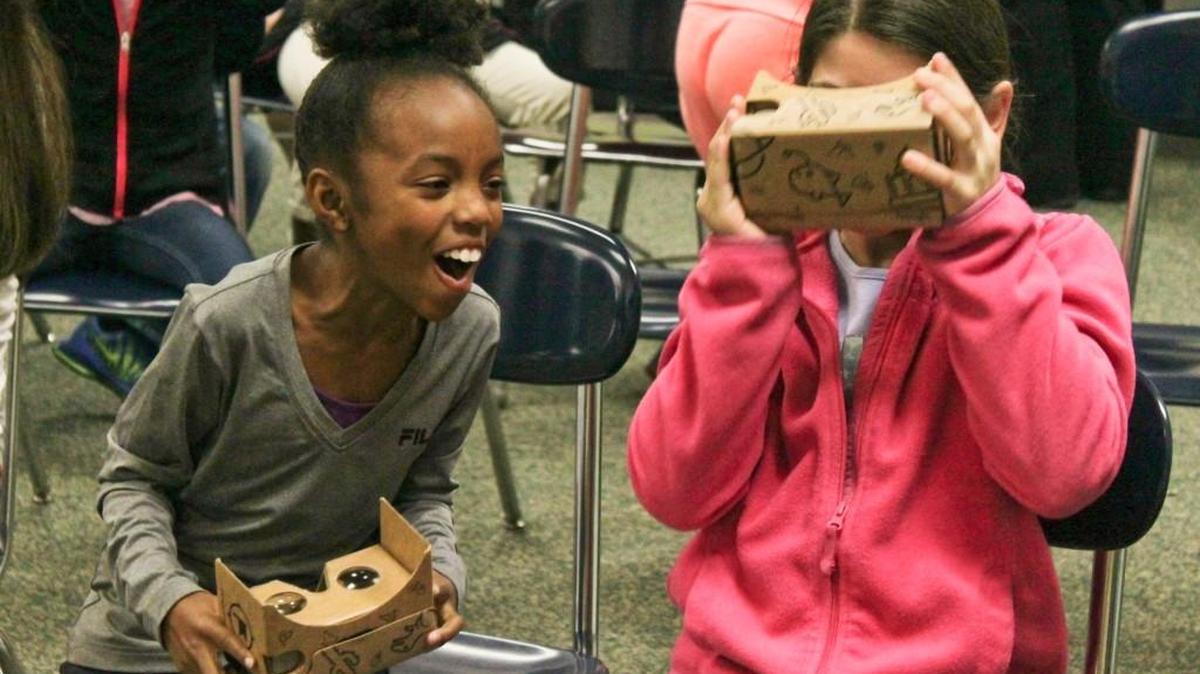 Malaysia Martin, left, and Nicole Mondello use their goggles to explore the world.