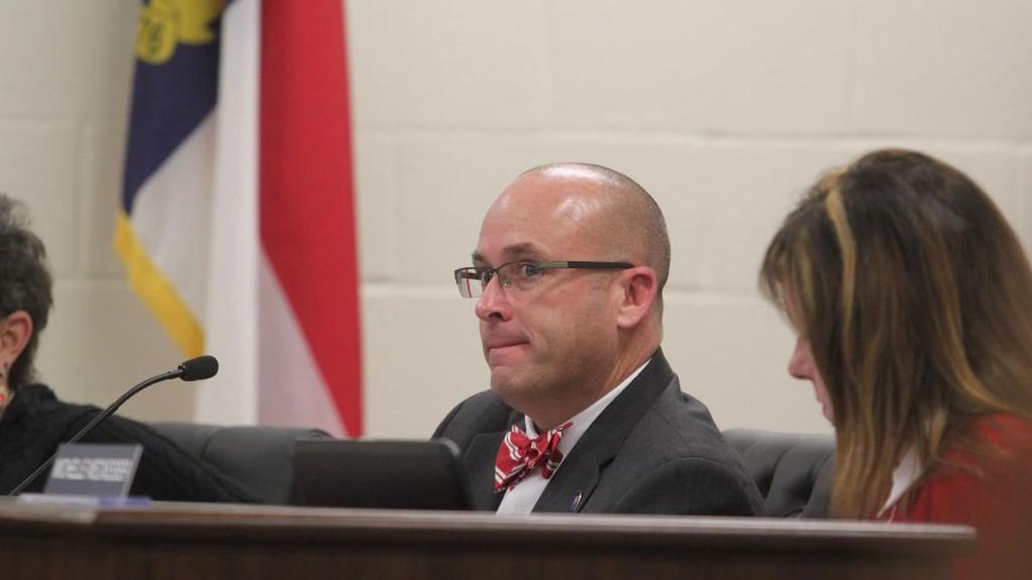 New Johnston County Board of Education member Todd Sutton listens to a presentation at the board’s February meeting.