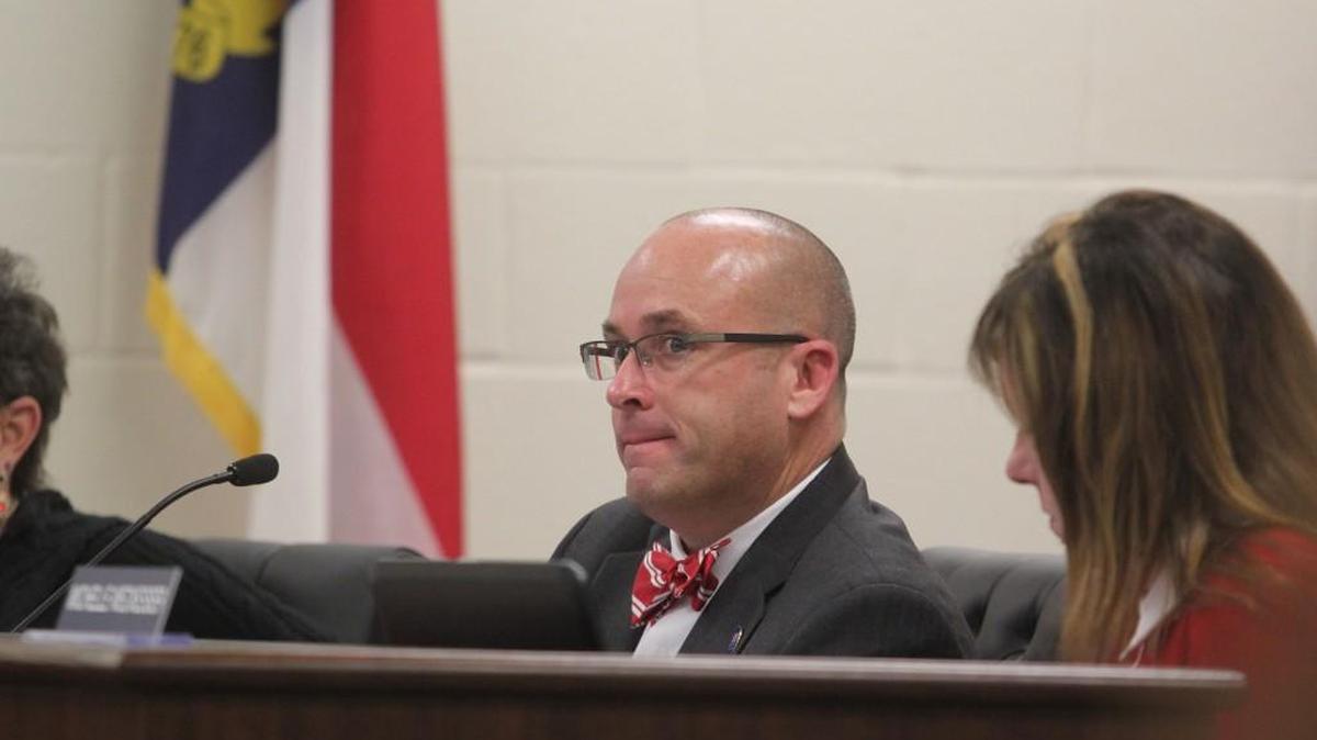 New Johnston County Board of Education member Todd Sutton listens to a presentation at the board’s February meeting.