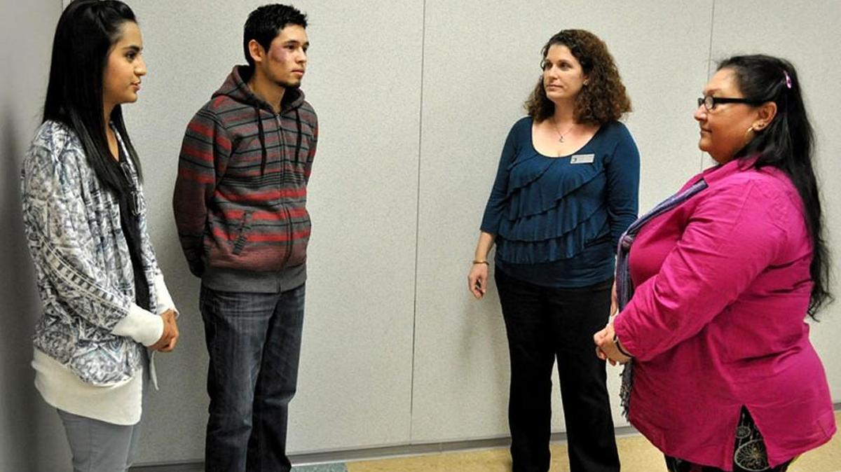 Dr. Jennifer Servi-Roberts, third from left, observes, from left, community Spanish-interpreting students Cristal Castaneda of Clayton, Luis Vera of Smithfield and Rita Harrington of Coats as they practice a medical Spanish-interpreting scenario.
