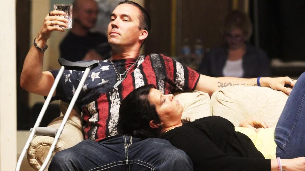 Actors Sean Douglas and Natasha Thompson play struggling married couple Brick and Maggie in the Neuse Little Theatre’s production of “Cat on a Hot Tin Roof.”