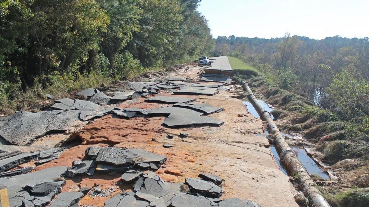 A section of Smith Road near Cleveland High School was lost to flooding from Hurricane Matthew.