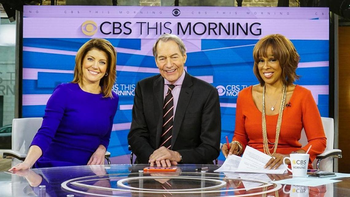 This image released by CBS shows, from left, Norah O'Donnell, Charlie Rose and Gayle King on the set of "CBS This Morning." Rose's co-hosts on "CBS This Morning" sharply condemned their suspended colleague Tuesday, Nov. 21, 2017, after the airing of sexual misconduct allegations that included groping female staffers and walking around naked in front of them, saying that it's a time of reckoning in society. (CBS via AP)