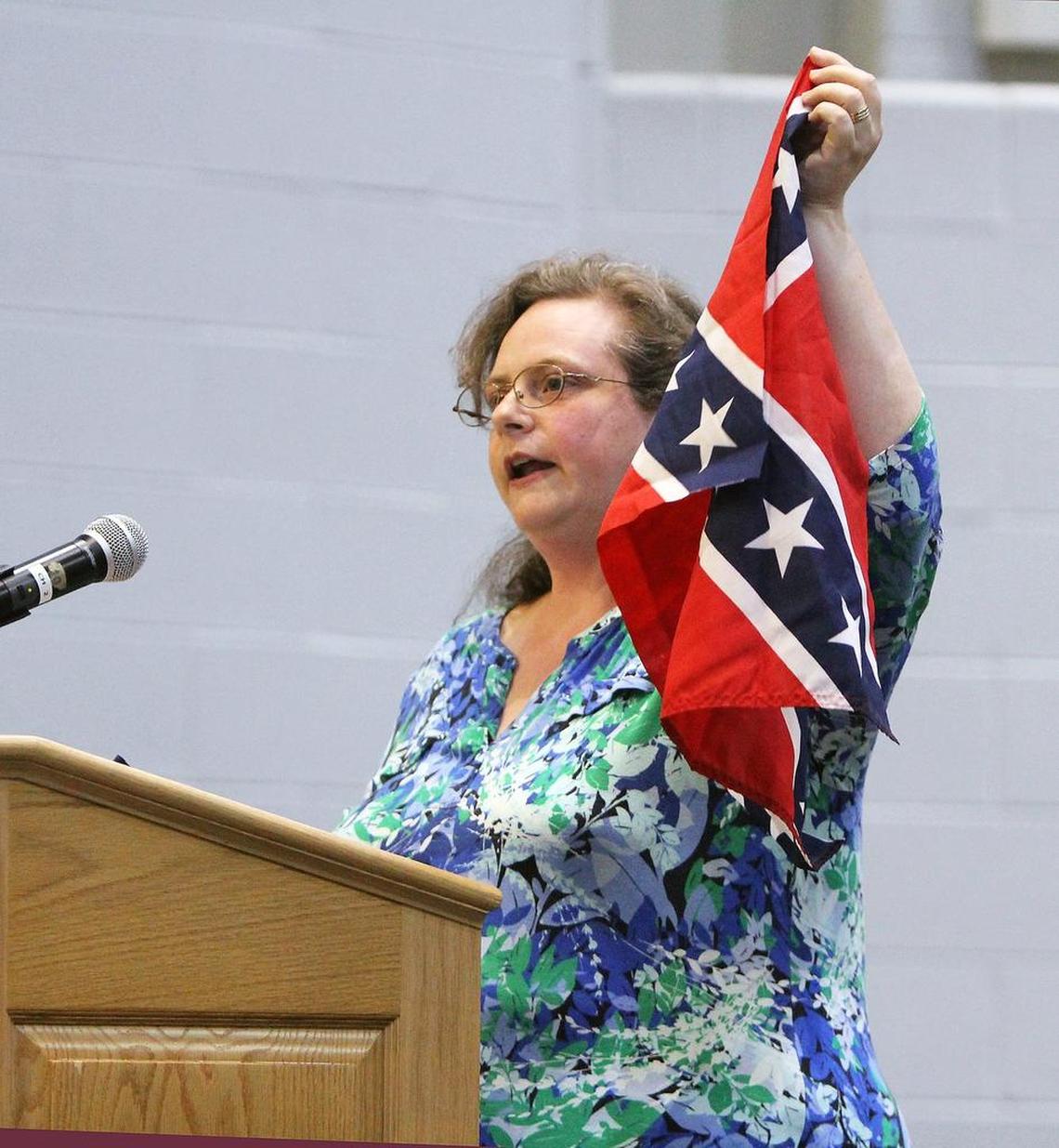 Hillsborough resident Katherine Walker, seen speaking in April 2017, was one of dozens of people who asked the Orange County Schools Board of Education to ban the Confederate flag on school system property.