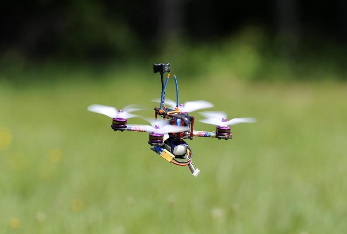 A quadcopter comes in for a landing during a race in Sanford, N.C., on Saturday, May 27, 2017. The machines carry cameras that enable their pilots to guide them using first-person view goggles.