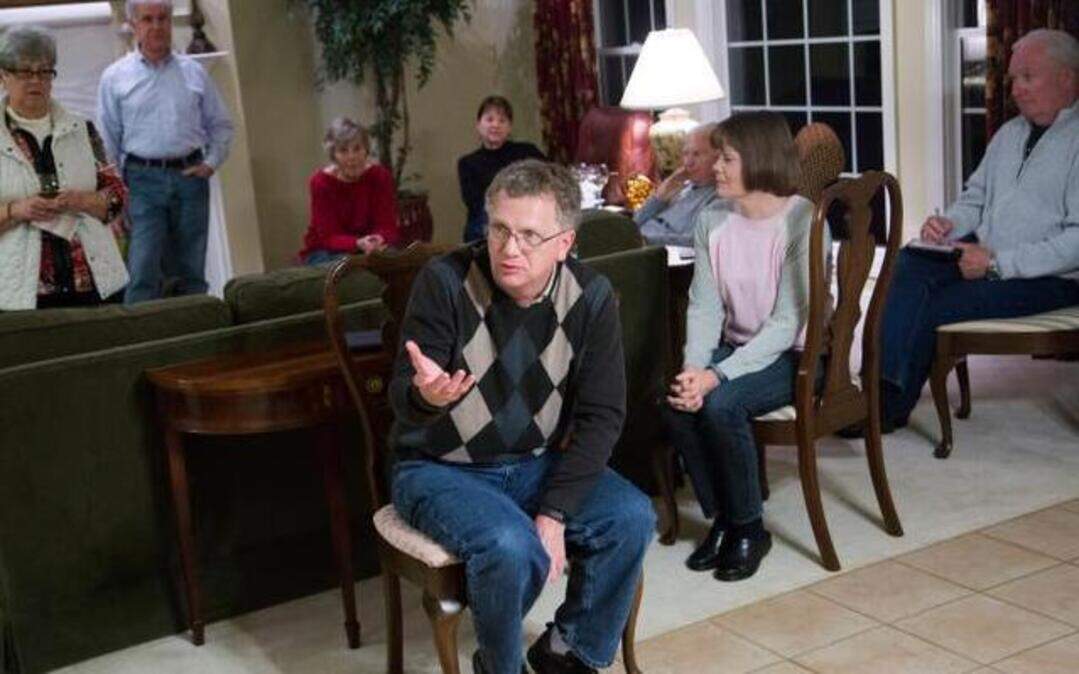 
David Cox, foreground, is leading the resistance to a proposed rezoning of a site for the intersection of Dunn Road and Falls of Neuse Road. His group, the North Raleigh Coalition of Homeowners Association, has already chased away a Publix grocery store.  
