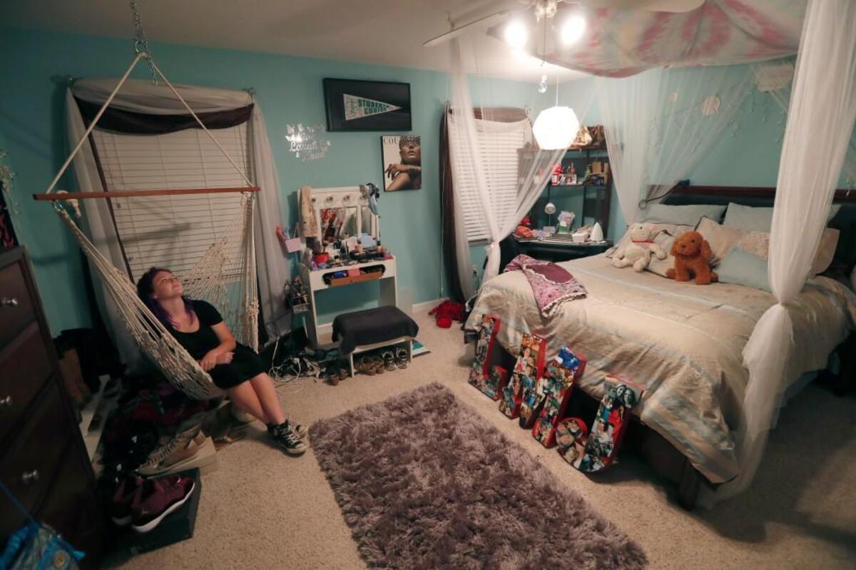 We’re all going to paint rocks now – for him and for her” says Allison Garrell, sitting in the room of Lauren Jenkins.