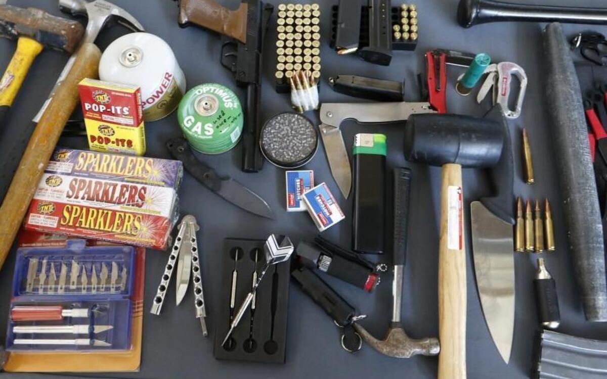 An array of some of the prohibited or hazardous items confiscated from RDU travelers in recent days was on display Tuesday, September 13, 2016, at the RDU Terminal 2 security gate during a press conference.
