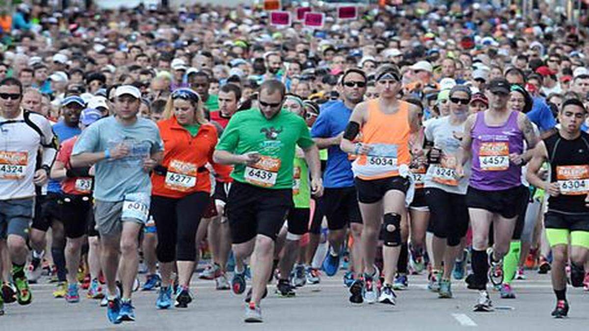 
Runners take off from the starting line of the Rock 'n' Roll Raleigh Marathon and 1/2 Marathon in downtown Raleigh on Sunday.
