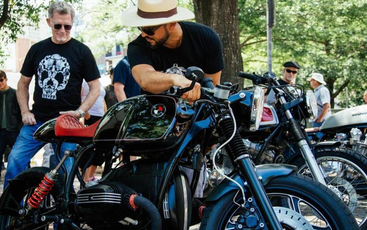 Alderson Neira, right, revs his bike's engine as Michael Glaubach, left, watches during Eurobike at City Market in Raleigh, N.C. on Sunday, Jun. 26, 2016.