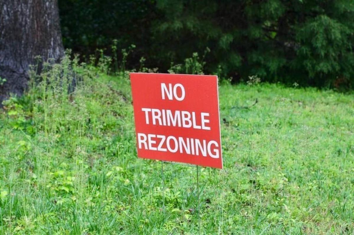 Residents of the Scottish Hills neighborhood made yard signs to protest the potential rezoning of 2.6 acres at the edge of their neighborhood, where Habitat for Humanity of Wake County asked to build 23, then 15, then nine, and then seven affordable homes.