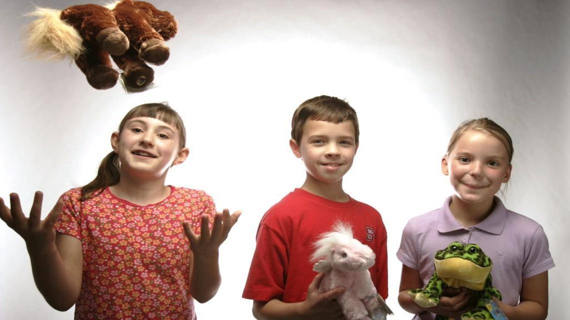 Evie Fordham, 9, left, Daniel Nance, 10, center, and Alex Johnson, 8, right, in 2007 when they won The N&O’s Webkinz essay contest.