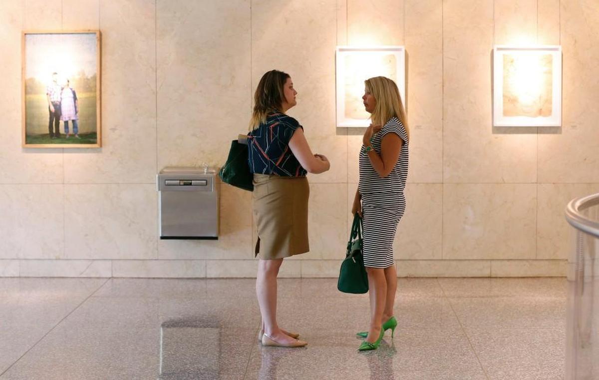 Tonya Baker Nelson, executive director of Hand of Hope Pregnancy Resource Center, right, talks with Calla Hales, now executive director of A Preferred Women’s Health Center, Raleigh in 2016 after the City Council discussed whether to allow Hand of Hope to have an office next door to A Preferred Women’s Health Center.