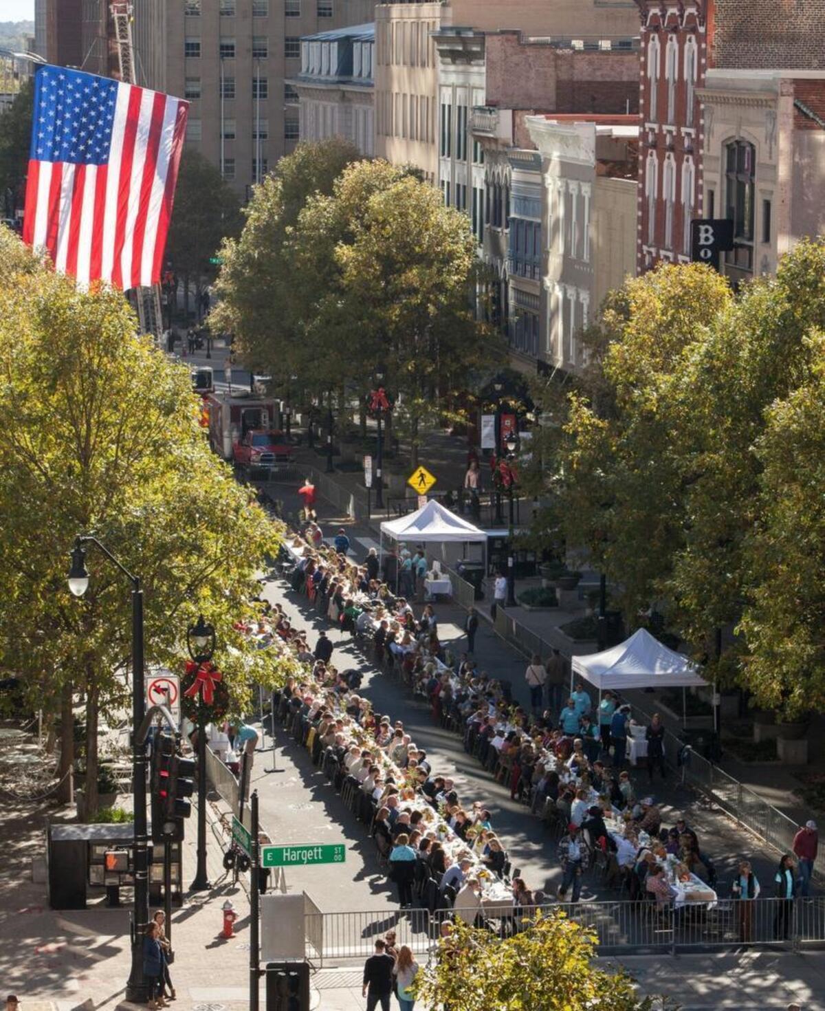 People gather for Sunday Supper on Fayetteville Street in 2016. A similar event will be Nov. 11, 2018, to raise money for those affected by Hurricane Florence.