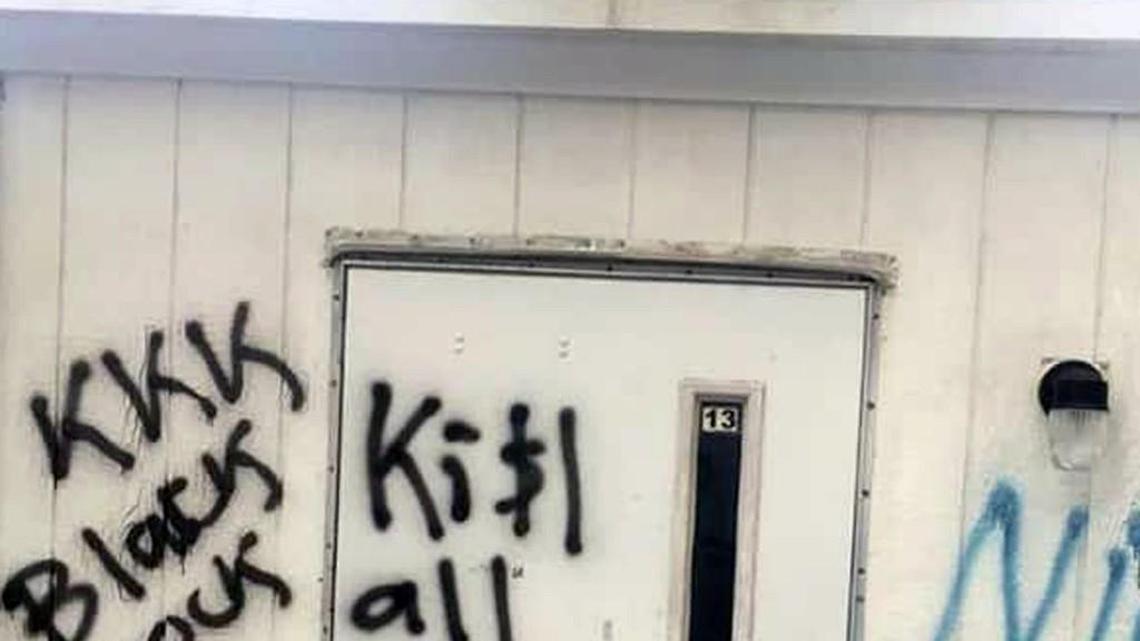 Graffiti on a building used for Sunday school and Bible study at Saint Francis United Methodist Church in Cary.