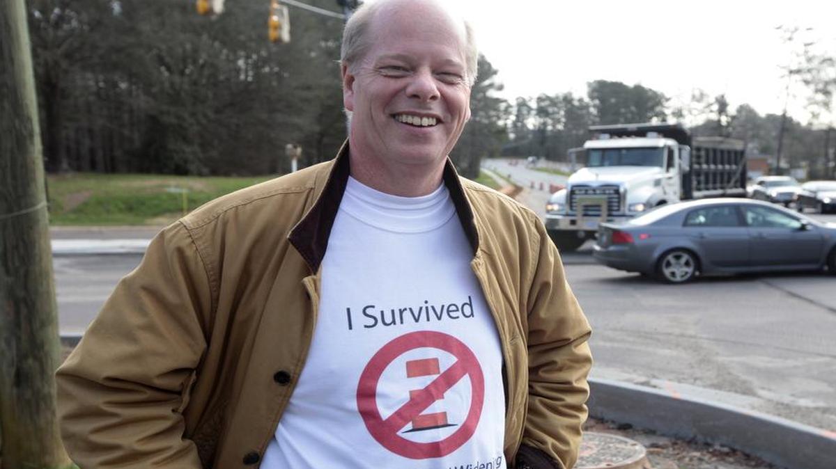 Allan Pharr, who lives in the Harrington Grove neighborhood in northwest Raleigh, created T-shirts to celebrate the completion of the Leesville Road widening project. Construction caused traffic woes for more than a year.