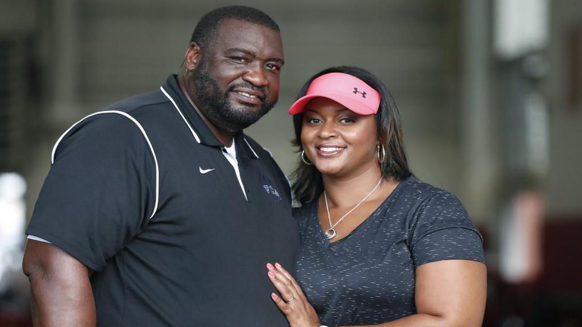 Keschia and Emerson Martin attend the N.C. State football prospect camp at Close-King Indoor Practice Facility in Raleigh.