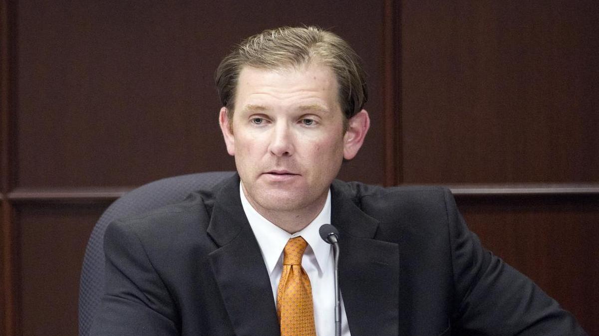 
Raleigh police officer Matthew Kohr ponders a question as he testifies on the witness stand in his case in a Wake County courtroom in Raleigh on May 6, 2015. He is suing Starbucks after he burned himself when a cup of coffee spilled on him. 
