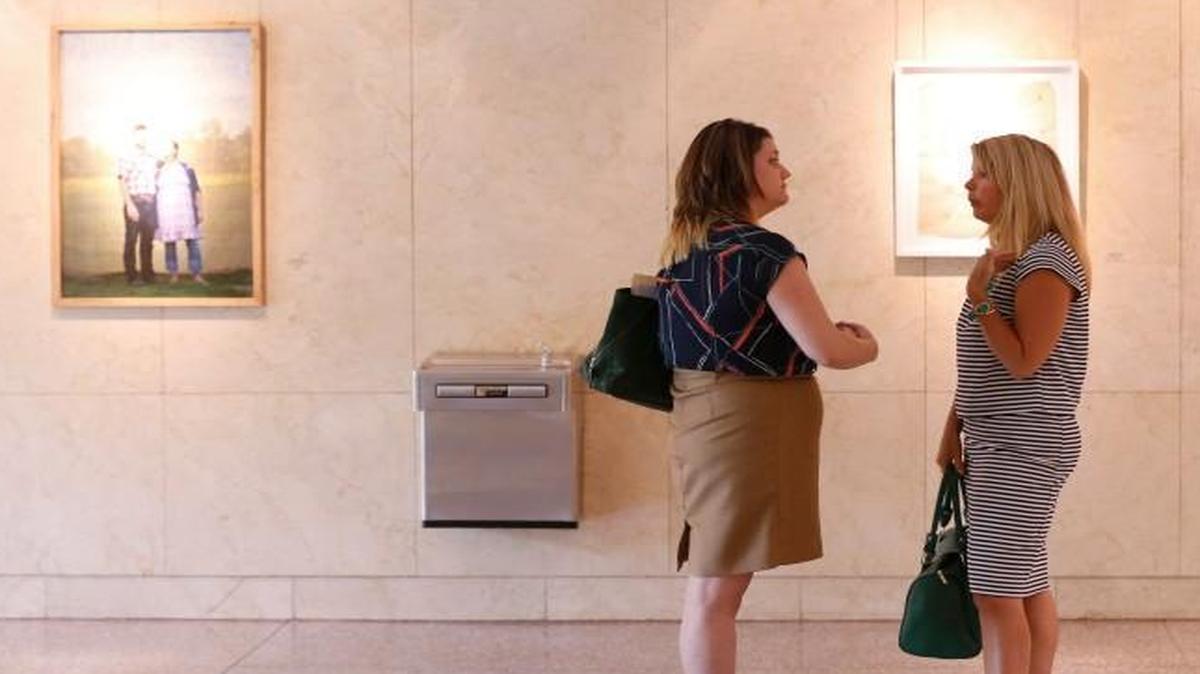 Tonya Baker Nelson, executive director of Hand of Hope Pregnancy Resource Center, right, talks with Calla Hales, communication and budget coordinator for A Preferred Women’s Health Center after the City Council discussed the zoning in June 2016.