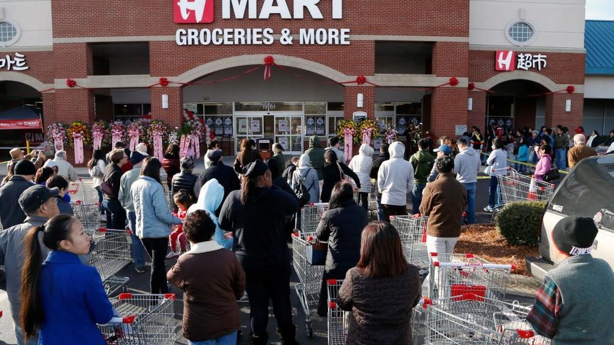 Even before the doors opened for business, dozens gathered outside, shopping carts at the ready, as the new H-mart Asian grocery store opens in Cary, NC on Dec. 22, 2016. It is in a shopping center at the intersection of Davis Dr. and High House Rd.