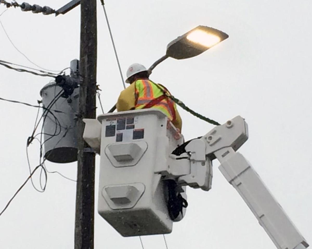 Duke Energy will come out and fix purple and blue streetlights for free once you report them.