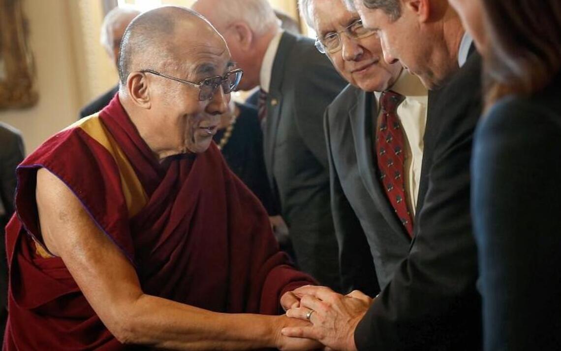 Busy Dalai Lama is still coming to Raleigh, but not until next year