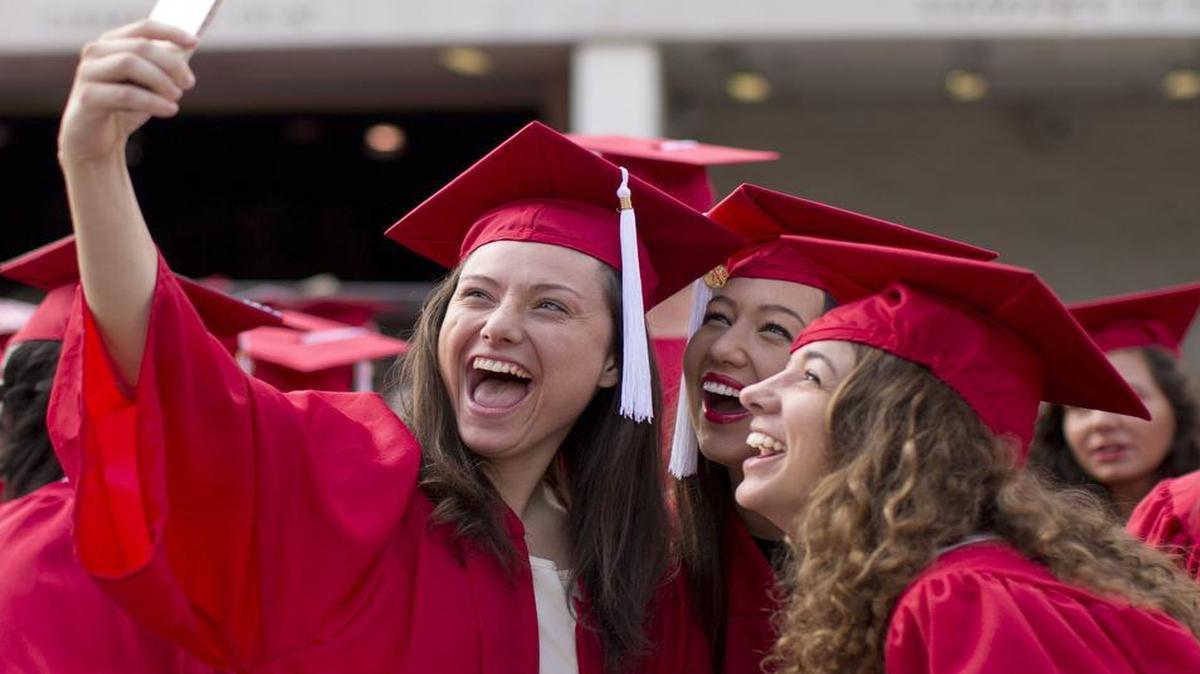 
From left, N.C. State’s Hannah Shore, Melina Sanderson and Maggie Haynes take a selfie before commencement on Saturday, May 9, 2015 in Raleigh, N.C.
