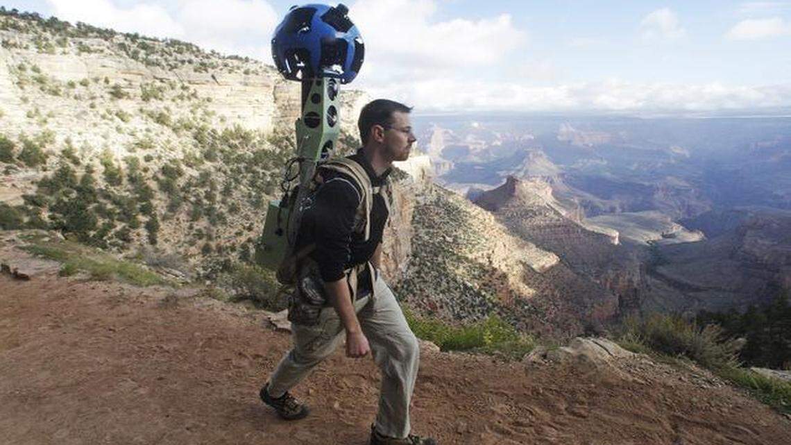 
Google product manager Ryan Falor demonstrates the Trekker, a 40-pound camera, for the media in 2012 at the South Rim of the Grand Canyon National Park. The company will loan the  unit to Raleigh to record some city trails and parks to feature in Google Trekker online. 
