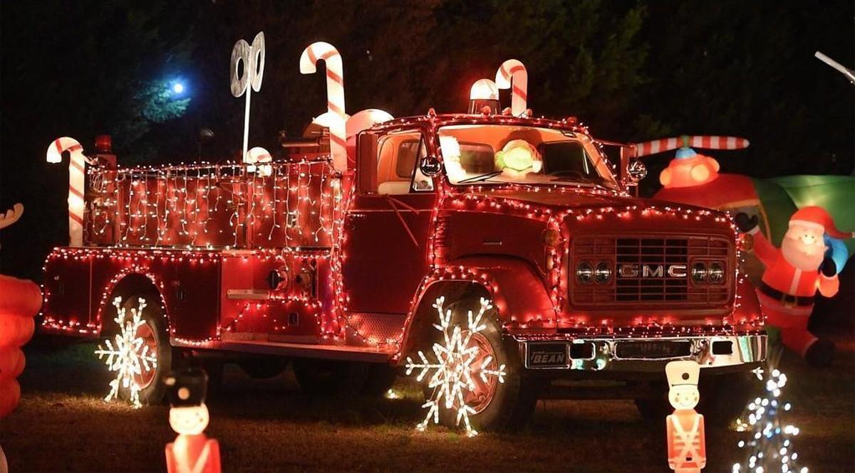 Happyland Christmas Lights is at the corner of Huntingwood Drive and Penny Road. Moore bought the fire truck from a used car lot after Hurricane Floyd.