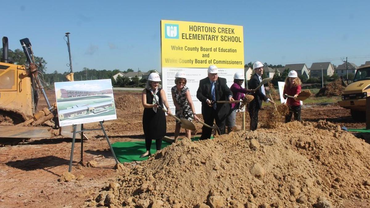 Wake County commissioners and school board members break ground on Hortons Creek Elementary School in Cary on June 7, 2016.