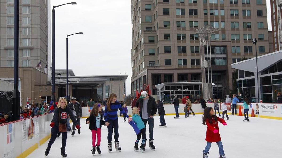 Skaters enjoy the outdoor ice rink in downtown Raleigh on Dec. 30, 2013.