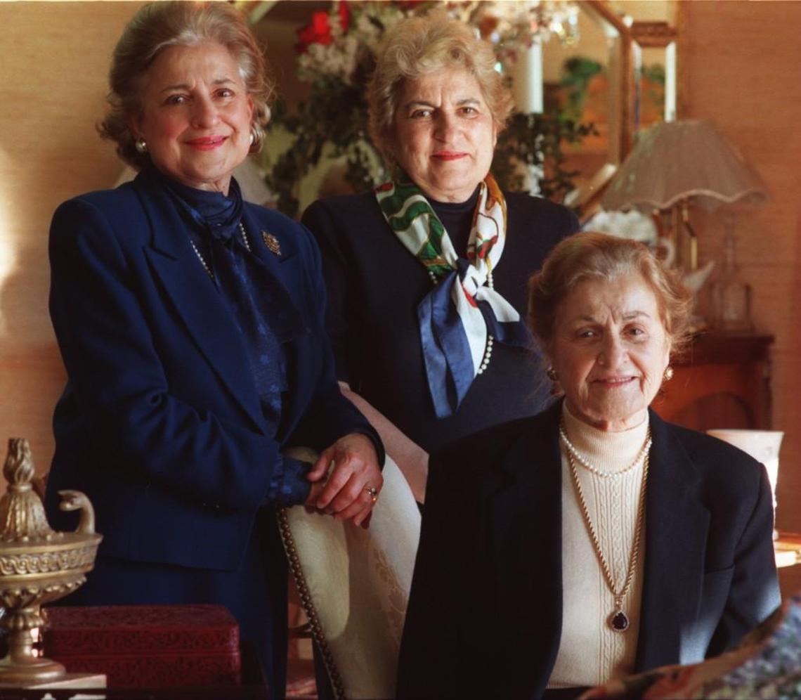 Porta Vallas (seated) and her daughters, Roxanne Serletis (left) and Vicki Pediadikatis (center) in their shop, National Art Interiors.