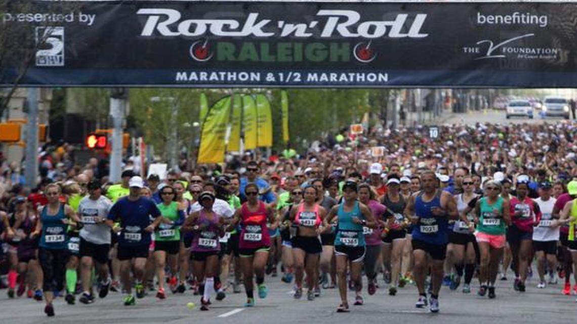 
Runners head down Salisbury Street during the Raleigh Rock 'n' Roll Marathon & Half Marathon in 2014.
