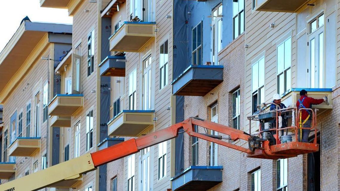 Crews work on a mixed-use project in Cary in 2013. Most construction and demolition materials in growing Wake County aren't recycled.