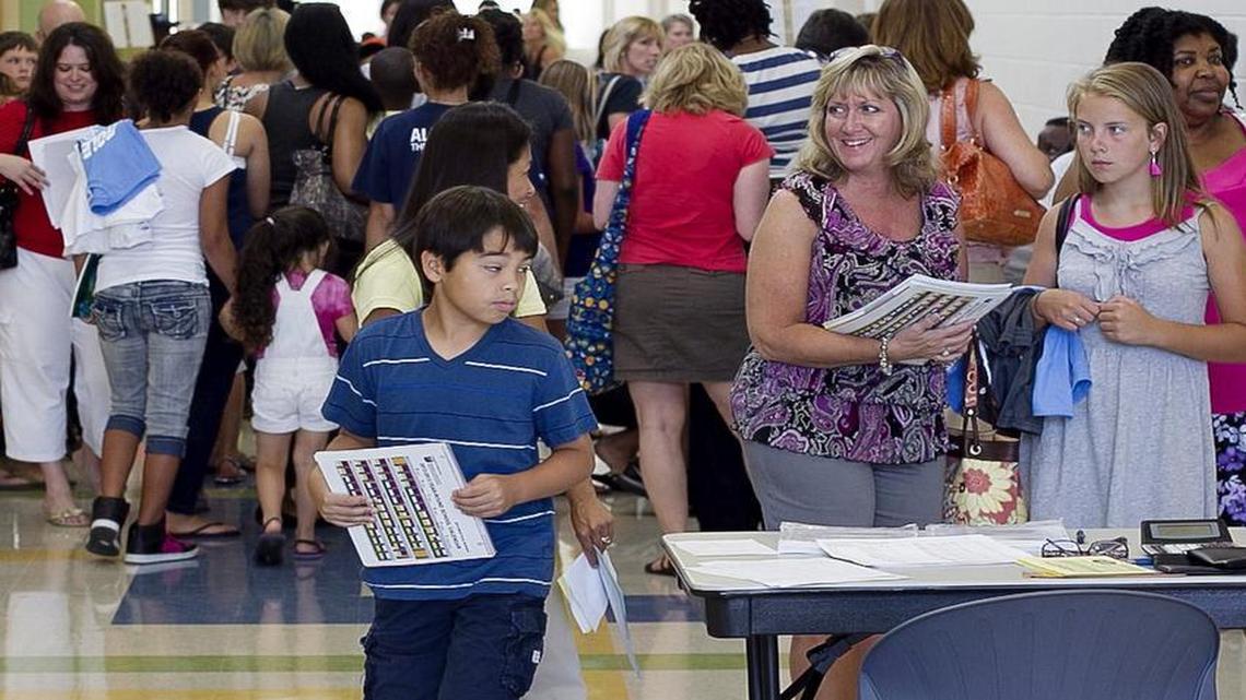 
Students and parents fill the hallways of Rolesville Middle School when the school opened in 2012. According to U.S. Census Bureau estimates, Rolesville has become the fastest growing town in North Carolina.
