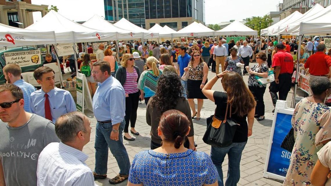 A large crowd came out on a beautiful day as the Raleigh Downtown Farmers Market opens for the year on May 6, 2015. Over a dozen vendors offered food, desserts and other items.