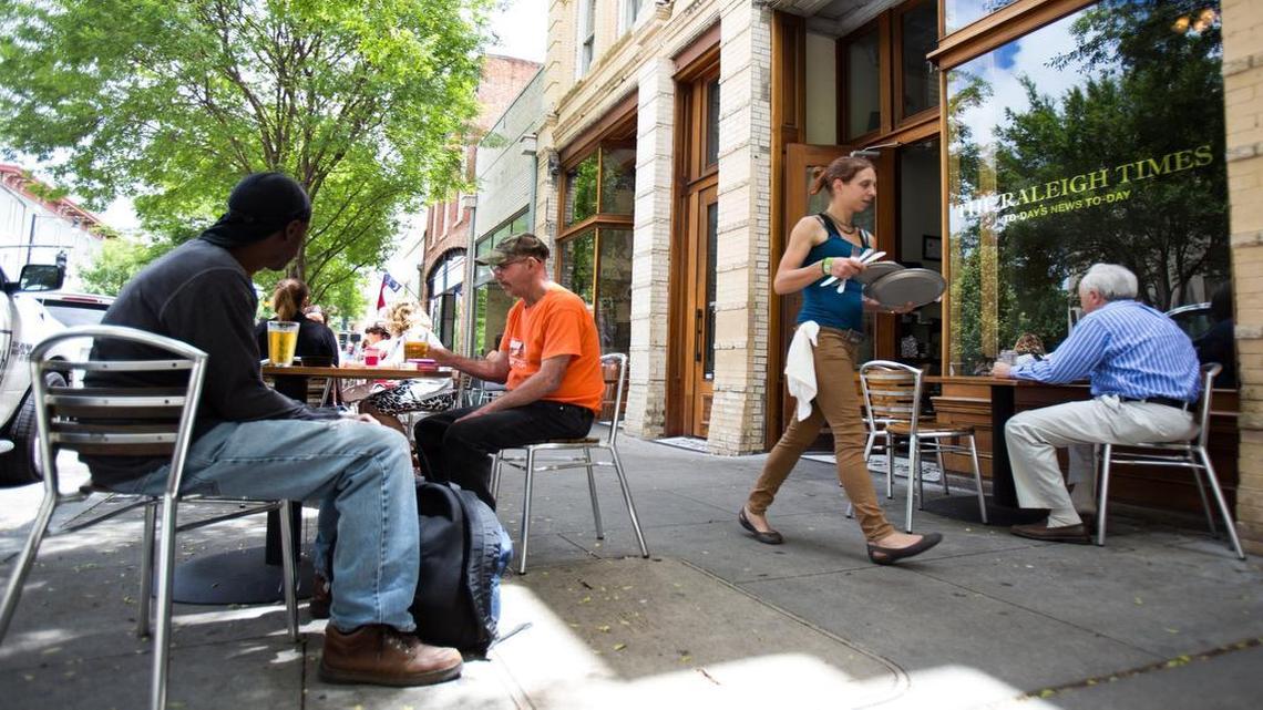 
City leaders are restricting the use of downtown sidewalks by bars and restaurants at night because they say patrons have become too loud and disruptive to residents.

