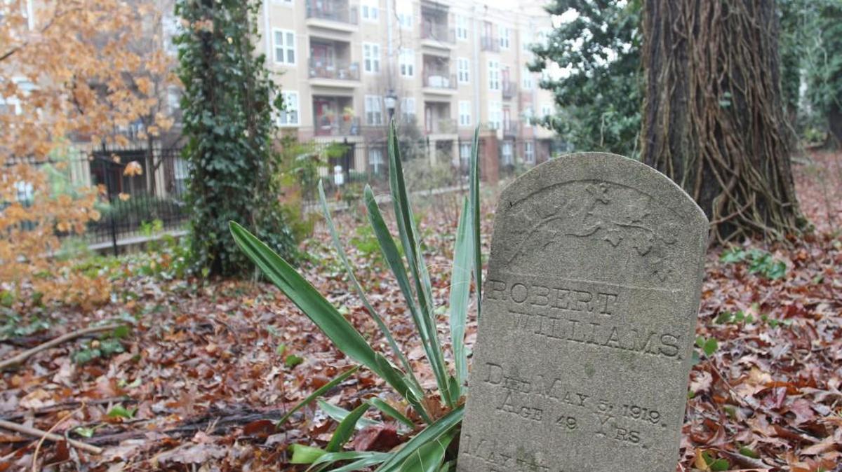 The historic Oberlin Cemetery, which dates to 1873, is now sandwiched between the Oberlin Court apartment complex and other commercial development. The Raleigh City Council on Tuesday, June 6, 2017, said it wants to move forward with efforts to designate a section of Oberlin Road as a historic district.