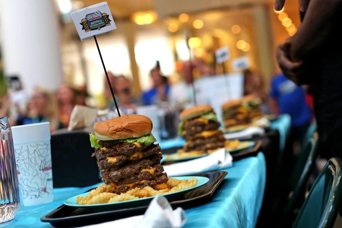 Hamburgers lined up before the Community Heroes Hamburger Eating Championship, hosted by Hwy 55 Burgers Shakes & Fries and All Pro Eating, at Crabtree Valley Mall in Raleigh on Saturday, May 20, 2017.
