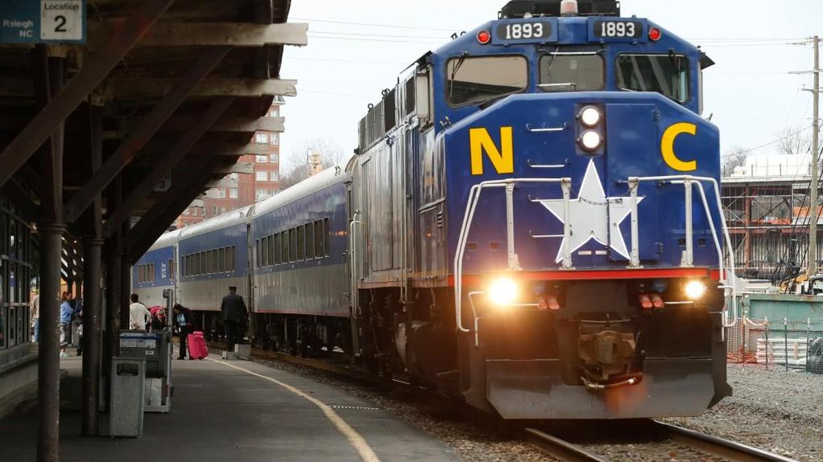 Passengers get on and off as the Amtrak Piedmont train coming from Charlotte as it stops in downtown Raleigh on Jan. 17, 2017. The recently approved infrastructure bill includes an unprecedented boost for the nation’s passenger rail system.