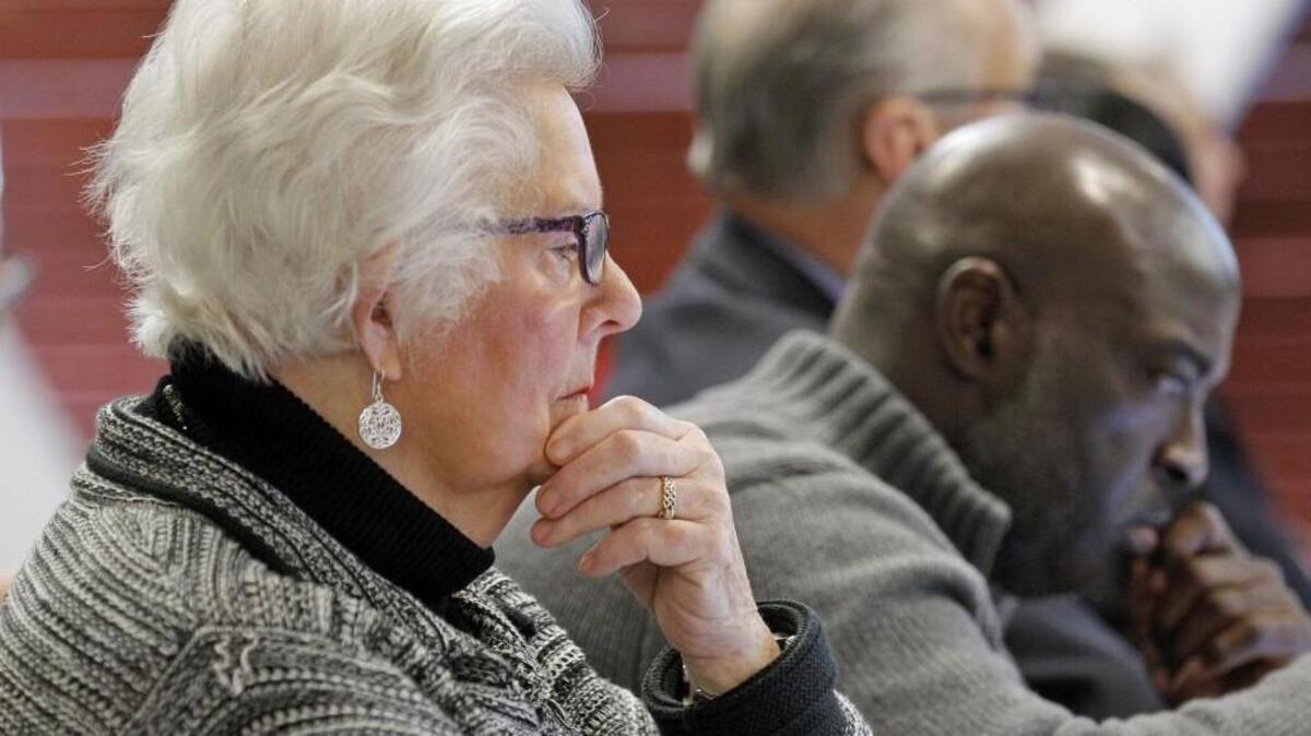 Wake County Commissioner Betty Lou Ward, left, and Wake County School Board member Keith Sutton listen during a joint meeting between the Wake Co. Commissioners and the Wake Co. School Board held at PNC Arena in Raleigh on Jan. 26, 2015.