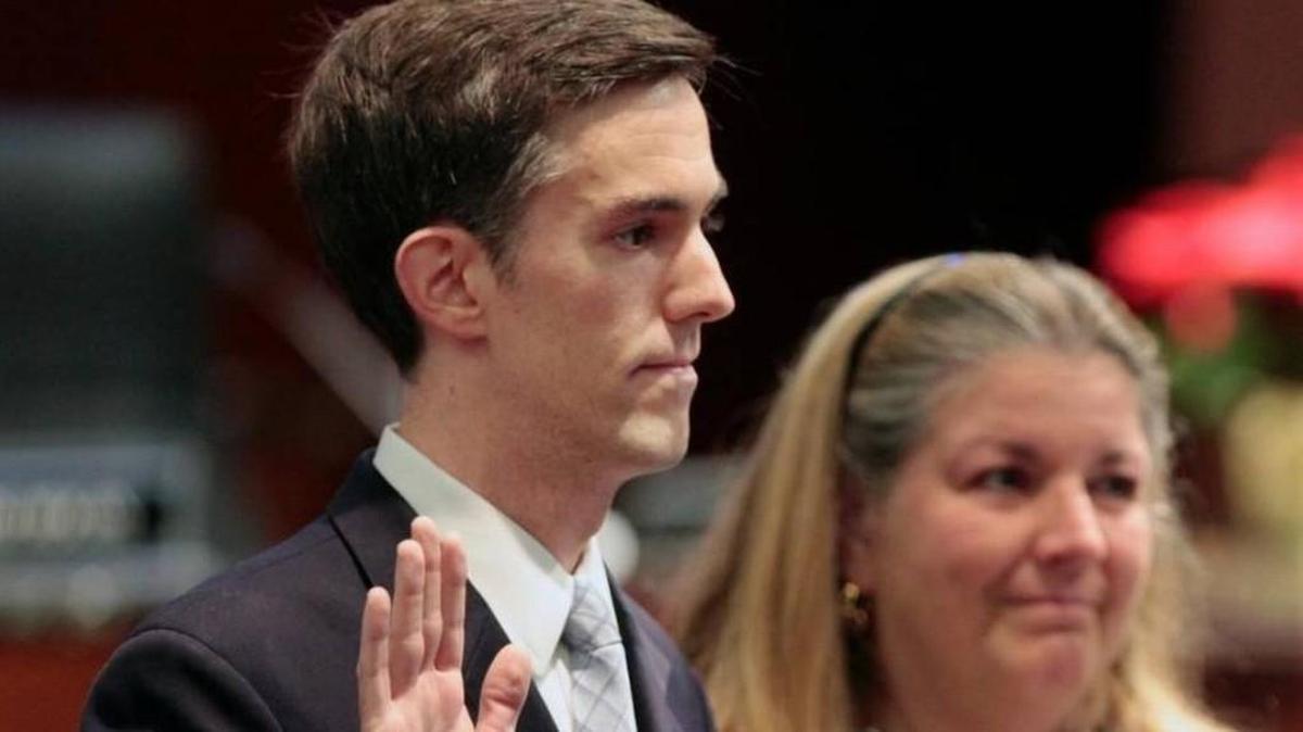 Matt Calabria, left, was sworn in to the Wake County Board of Commissioners on Dec. 1, 2014.