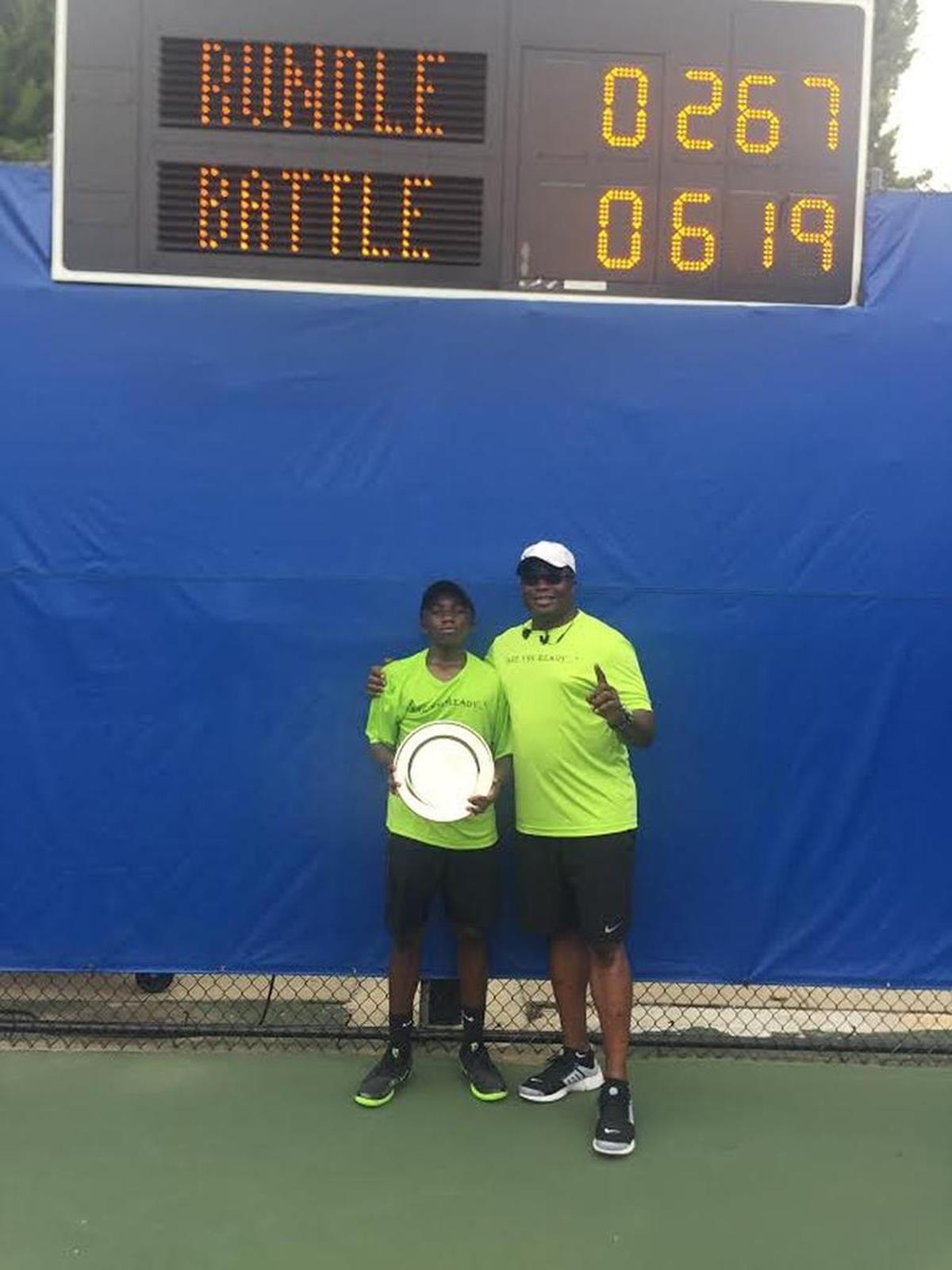 Lincoln Battle and his father, Chris Battle, who passed his love of tennis on to his son.