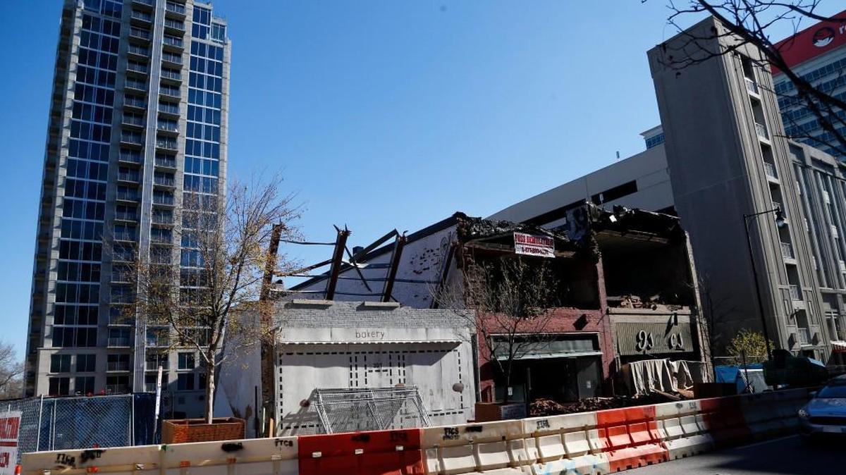 The Reliable Jewelry and Loan shop, which has been a pawn shop in Raleigh for over a half-century, recently moved from its old location, which is seen here being torn down to make room for a new project, to a more upscale location down the street in downtown Raleigh on Wednesday, Dec. 7, 2016.