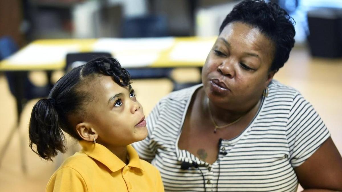 Janet Nunn says switching from a public school to Victory Christian Center School has made granddaughter Nariah Hunter a better reader.