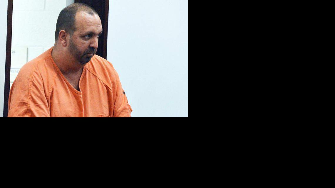 
Craig Stephen Hicks, 46, enters the courtroom for his first appearance Wednesday, Feb. 11, 2015, at the Durham County Detention Center. 
