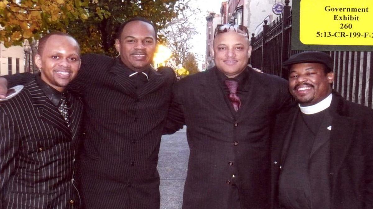 A photograph introduced into evidence shows Ronald McCullough, far left, and David Mayhew, second from right. The other two men are not identified.