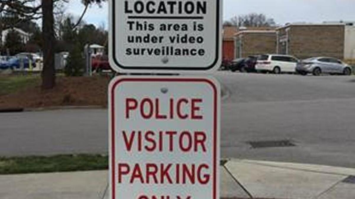 Signs mark the new Internet exchange location at the Apex police station.