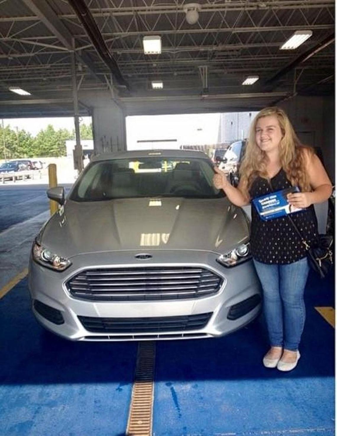 Allison Christine Cope of Raleigh is seen with her car, a silver, 2014 Ford Fusion with North Carolina plate EHA 2271. The car, officials said, has a “Change of Heart Pit Bull Rescue” sticker in the back window.