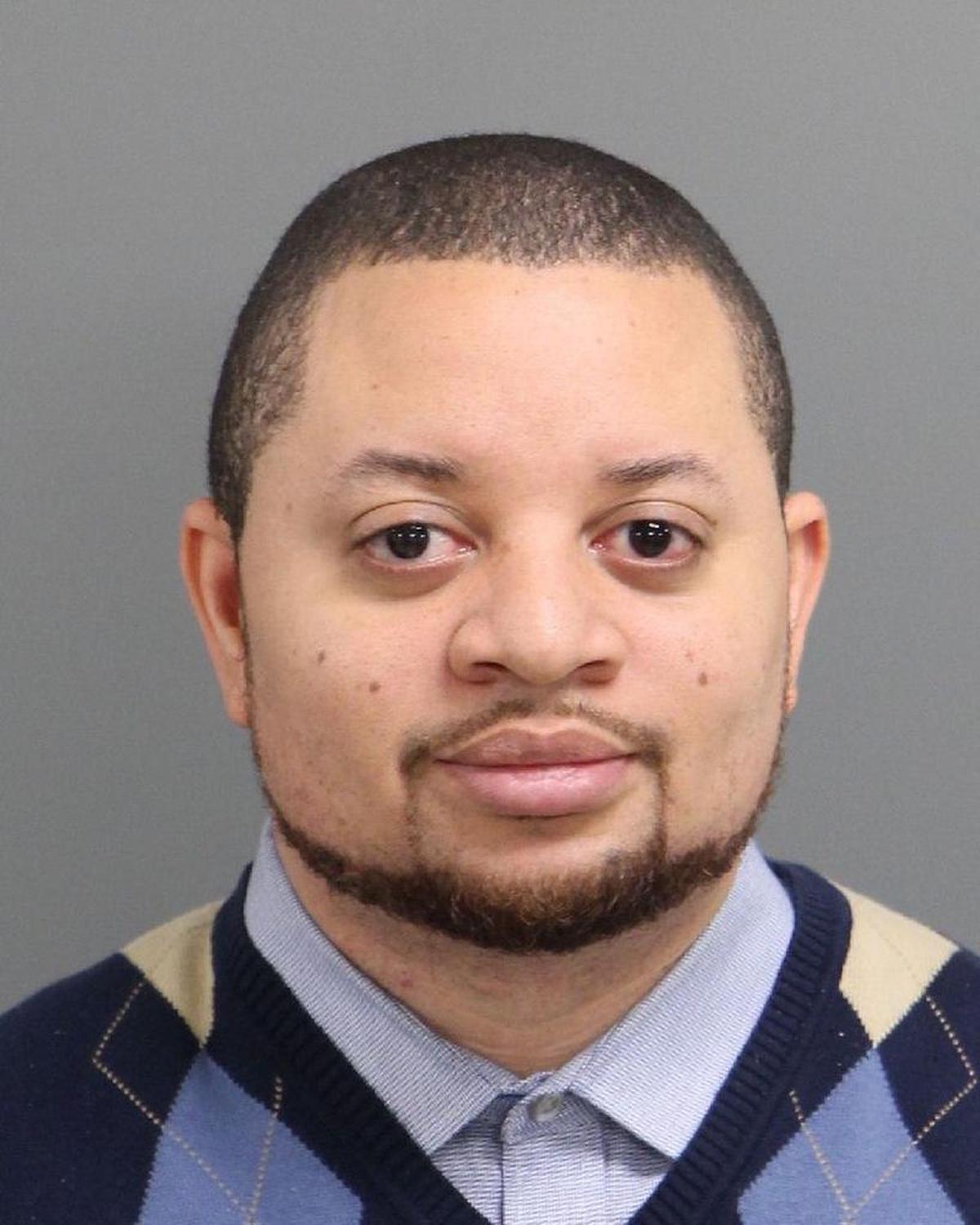 Troy Ellis in a booking mug on Wednesday, Dec. 13, 2017.